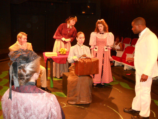 New Jersey Youth Theatre Alumni Eryn LeCroy in the handbag discovery scene from Turning Leaf Theater Company's 2010 production of THE IMPORTANCE OF BEING EARNEST.